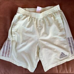 Pastel green adidas shorts. Size small 7in inseam. Great condition.